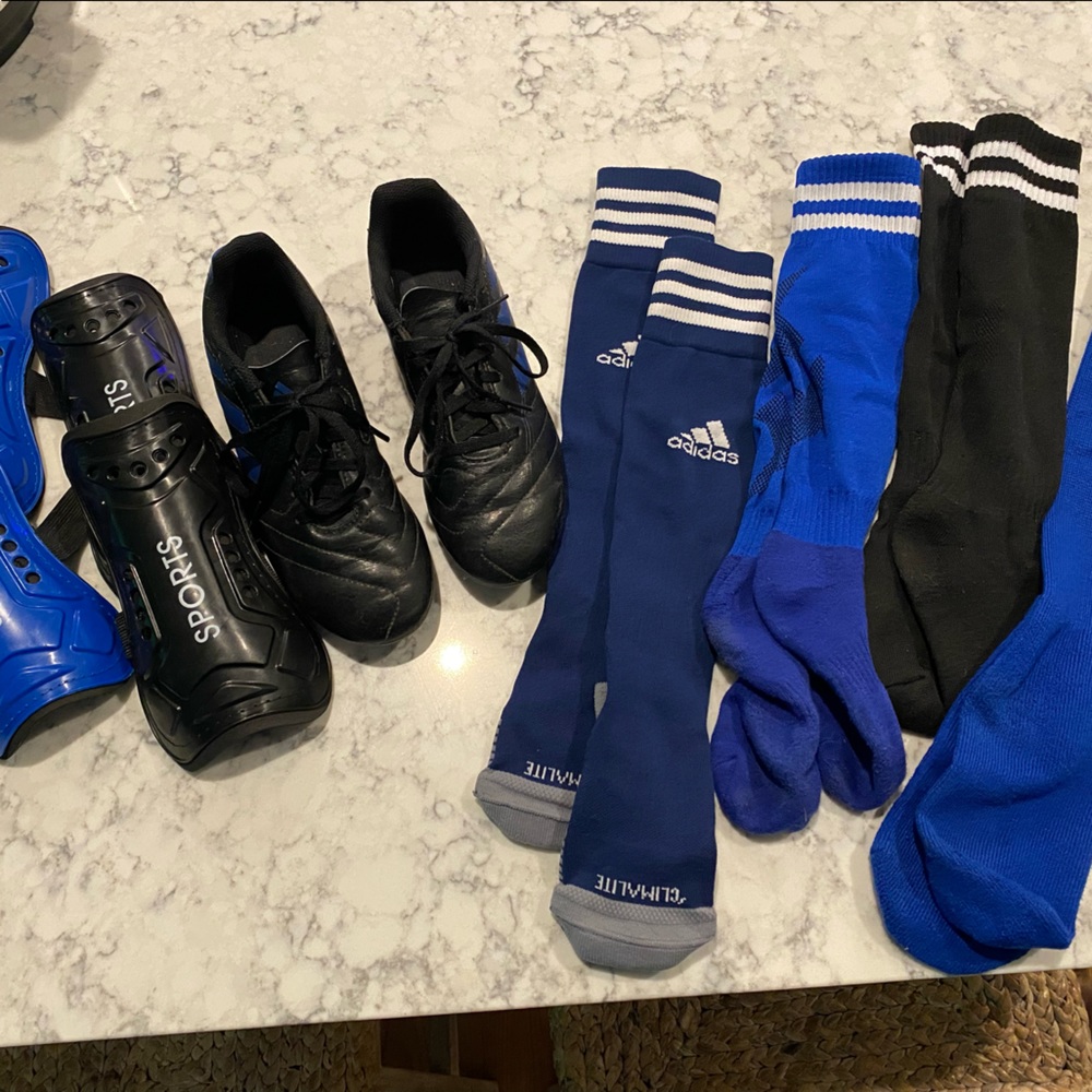Kids soccer cleats, socks and shin guards